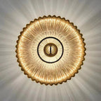 Applique Intermezzo vue de face, verre strié en soleil