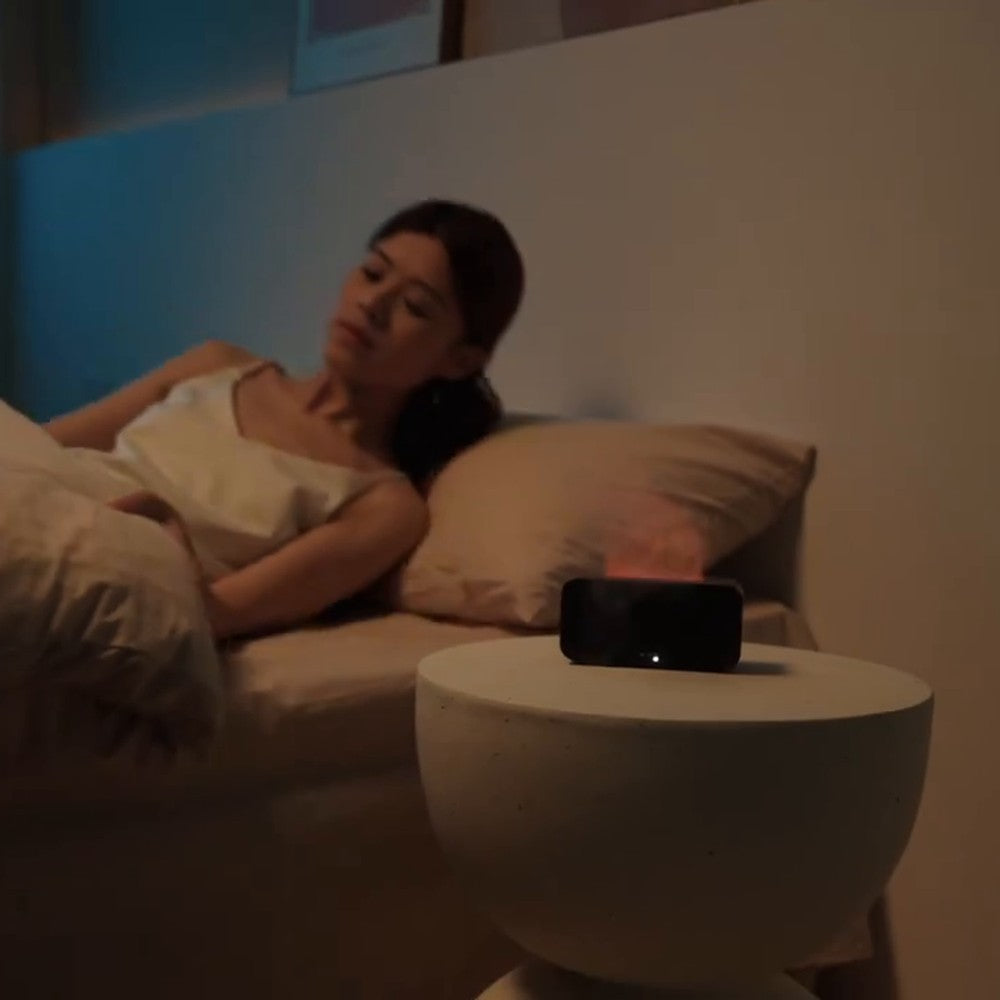 Diffuseur flamme compact Vibrato : dans une chambre, la nuit