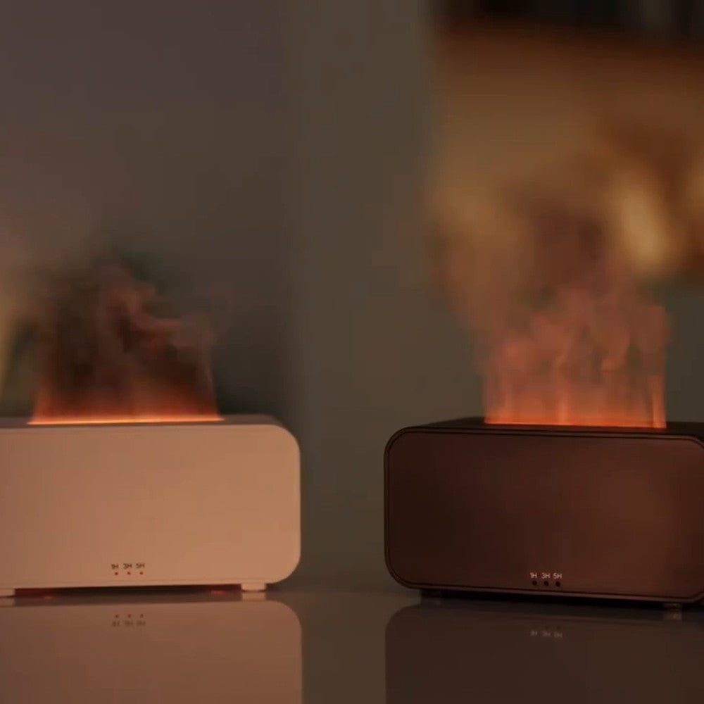 Diffuseur flamme compact Vibrato : coloris blanc et noir côte à côte