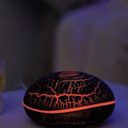 Diffuseur galet Cadence : lumière rouge, la nuit