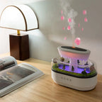 Humidificateur pluie Pastorale : à côté d'un livre