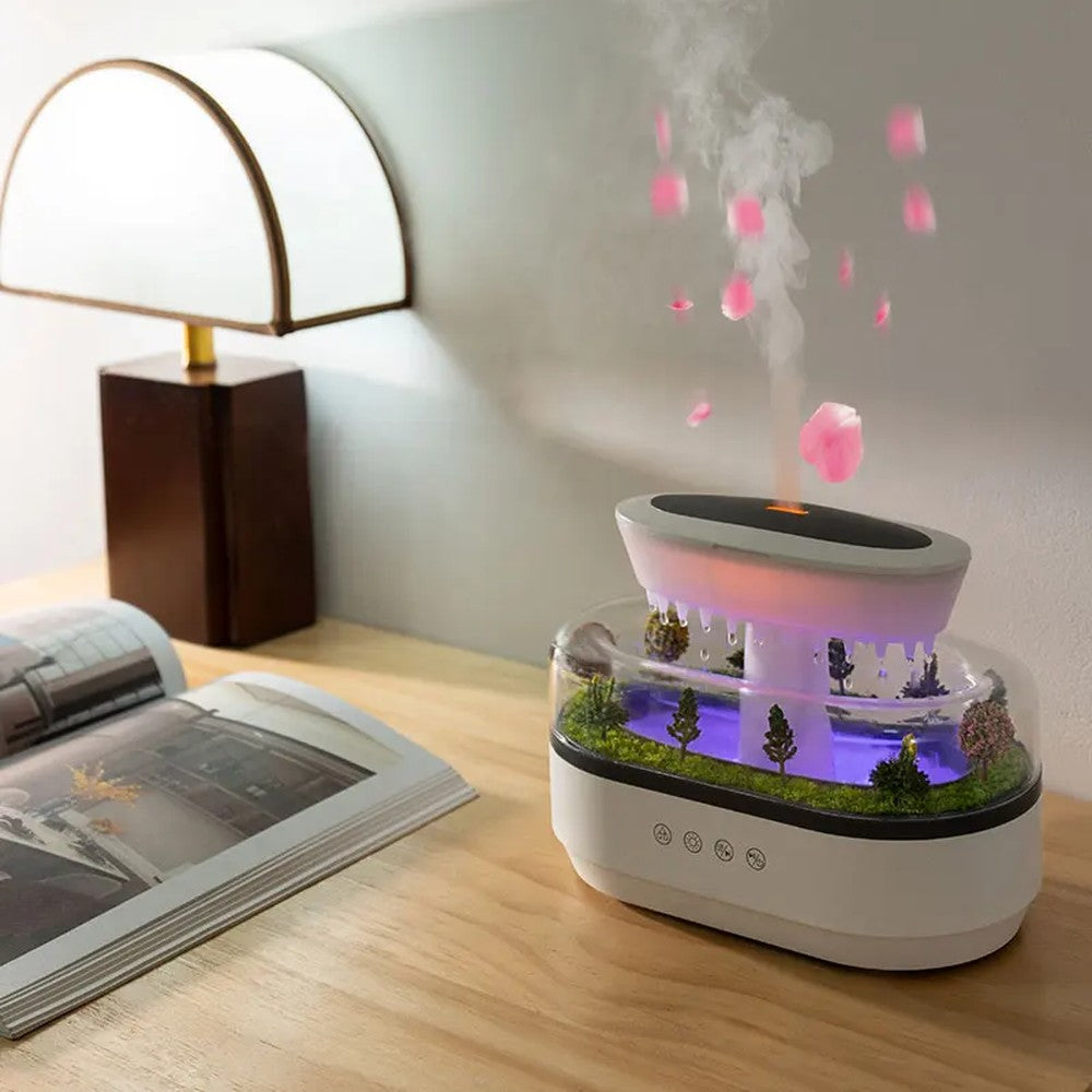 Humidificateur pluie Pastorale : à côté d'un livre